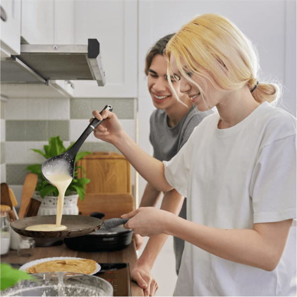 young people cooking together