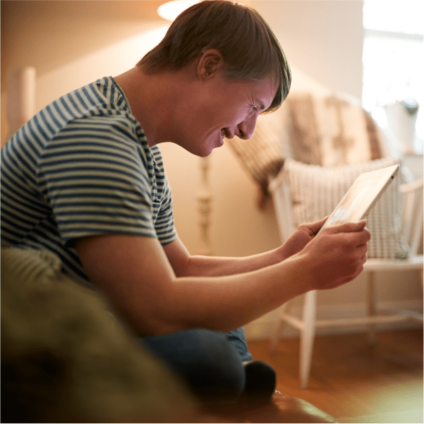 autistic young man in his apartment