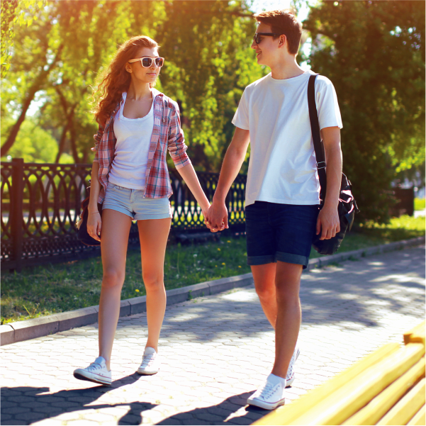 young couple walking hand in hand